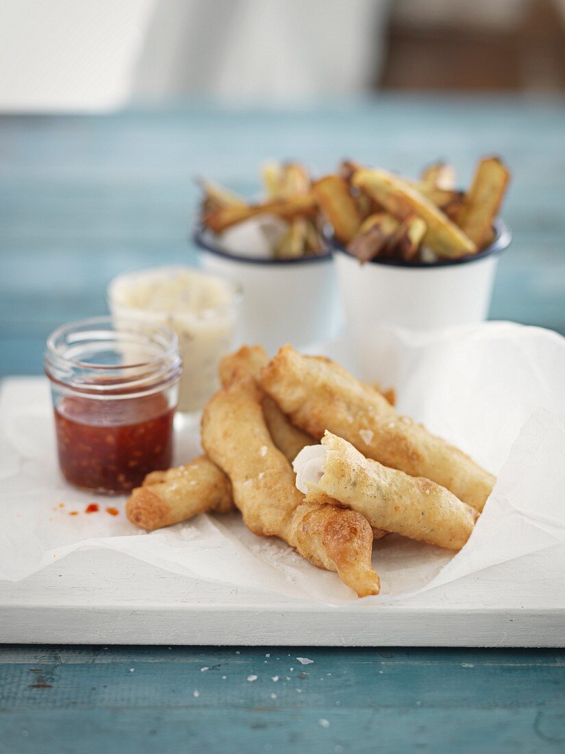 Battered fish with chilli sauce and chips
