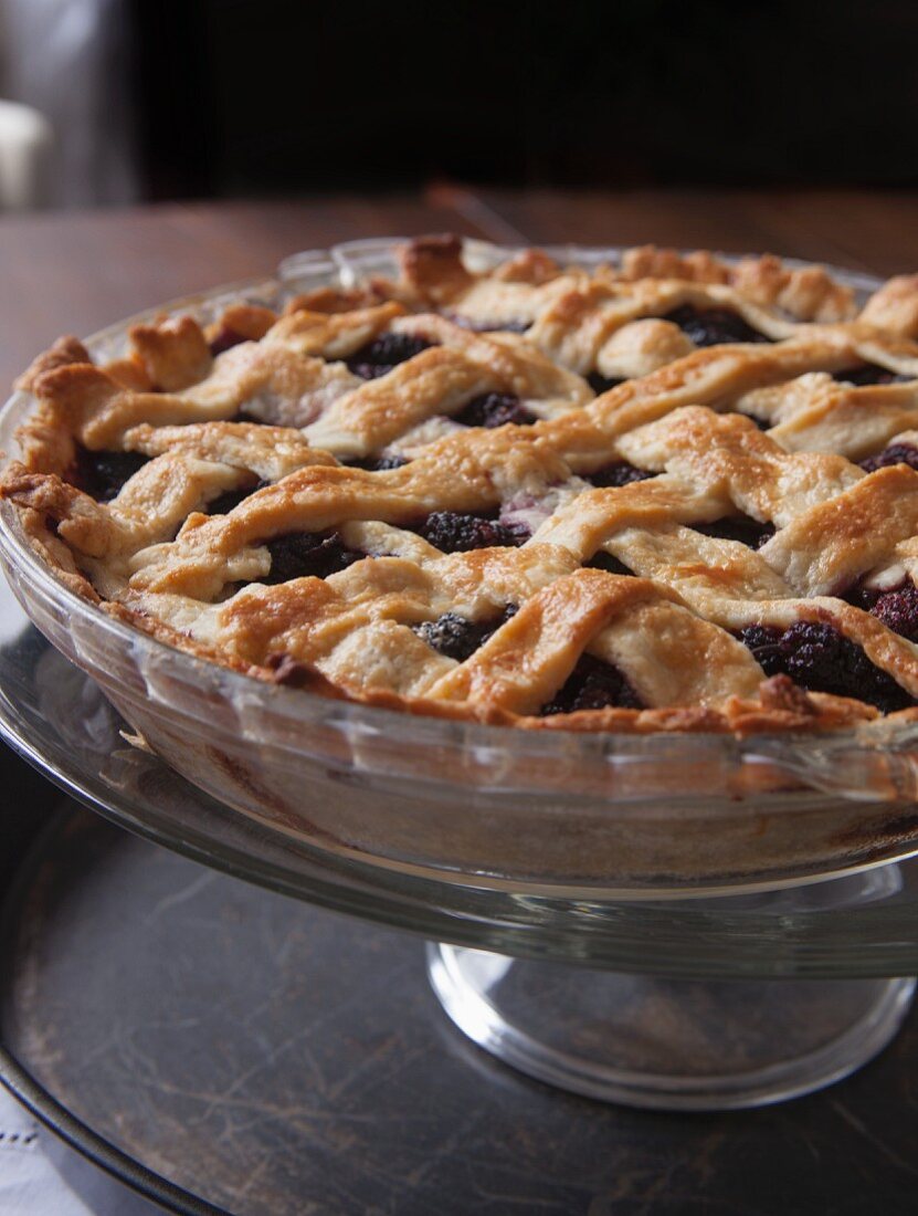 A whole mulberry pie with a lattice crust