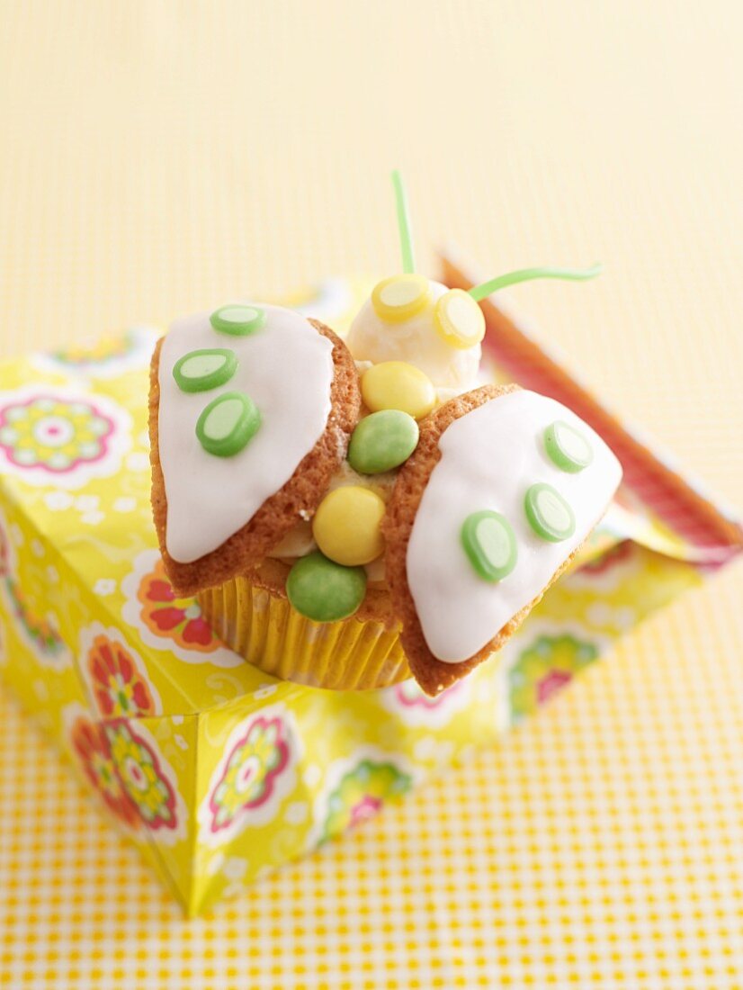 A cheerful butterfly cupcake