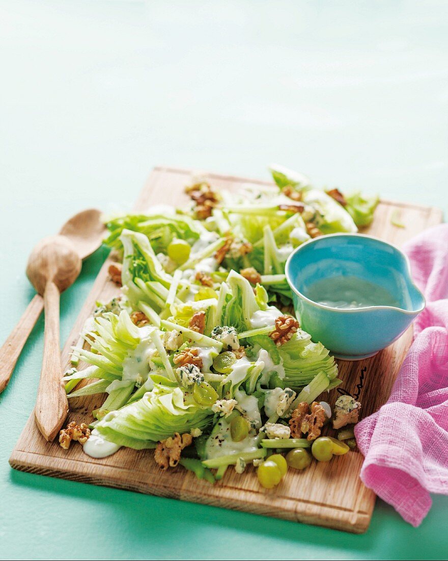 Iceberg lettuce with apples, grapes and walnuts