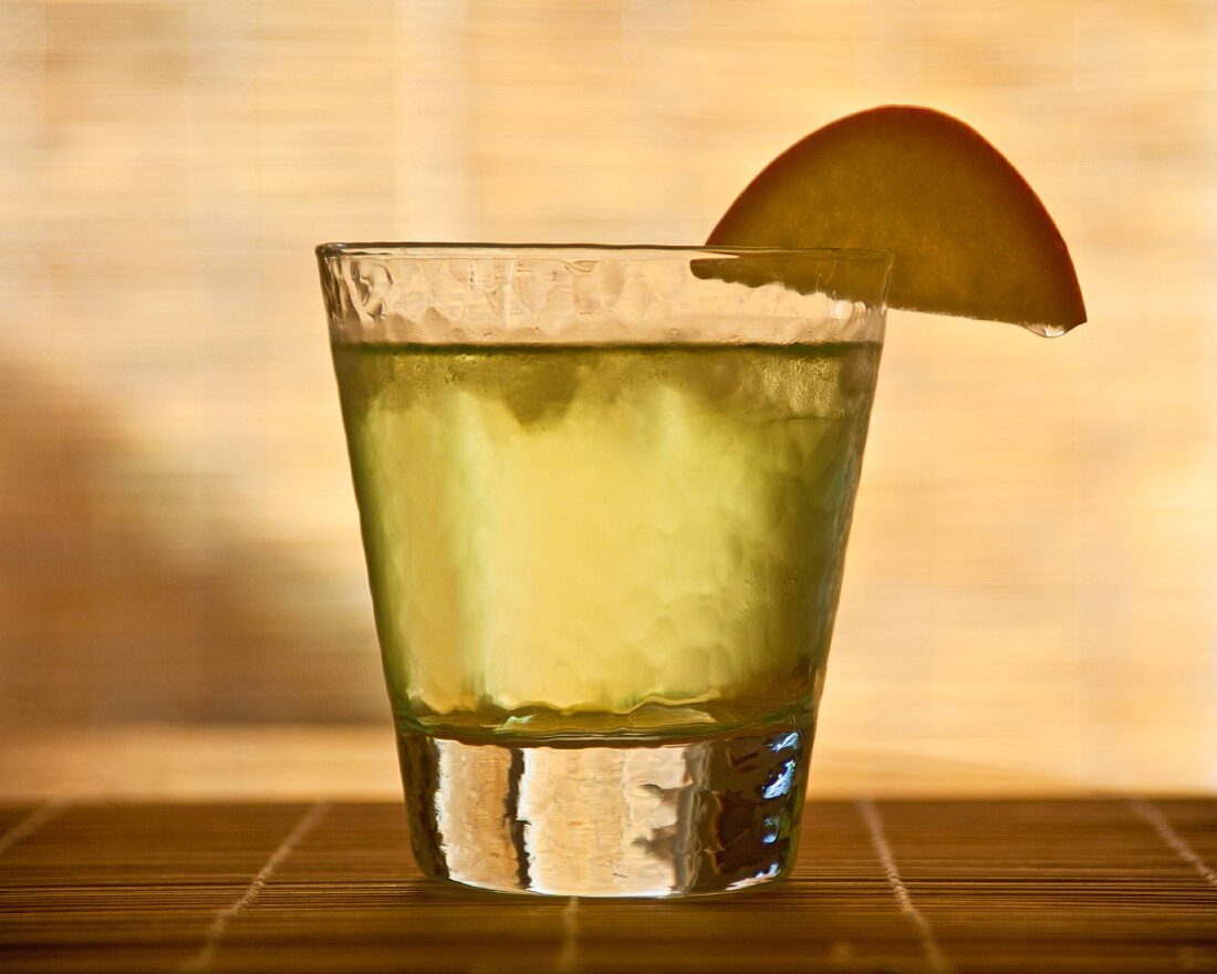 Apple Cocktail garnished with an apple slice