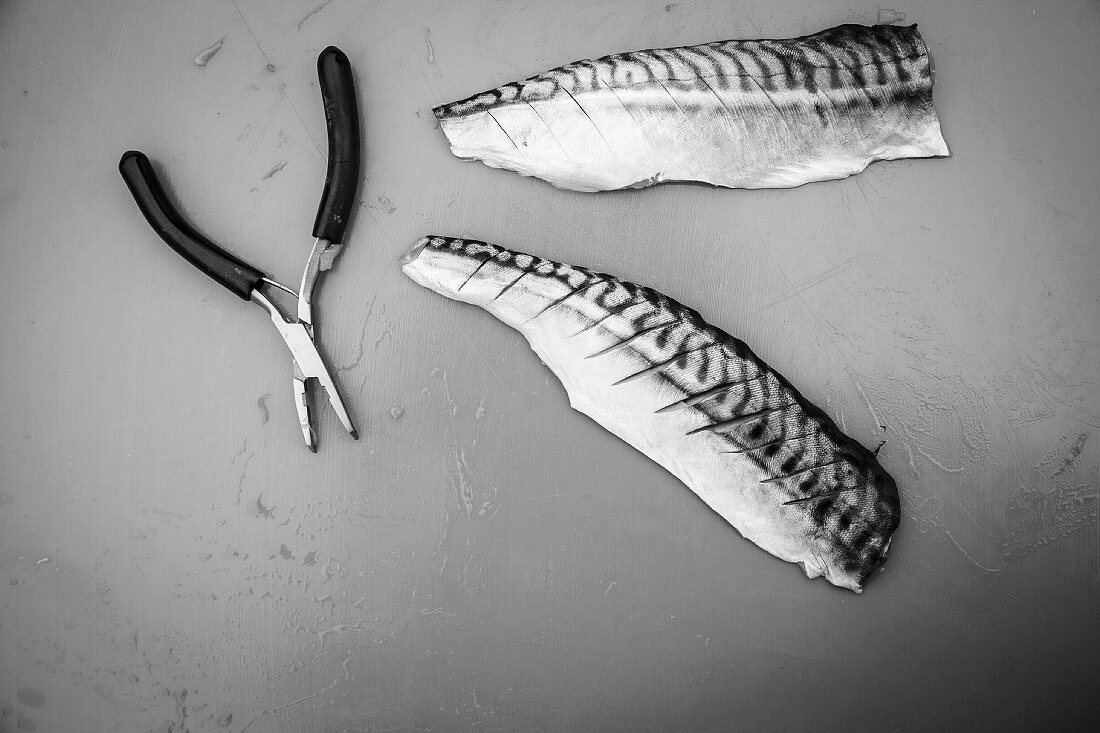 Scored, raw mackerel fillets