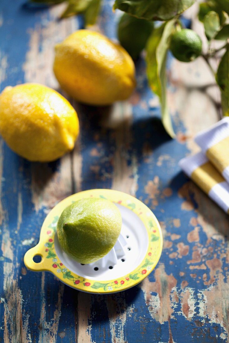 A lime on a juicer