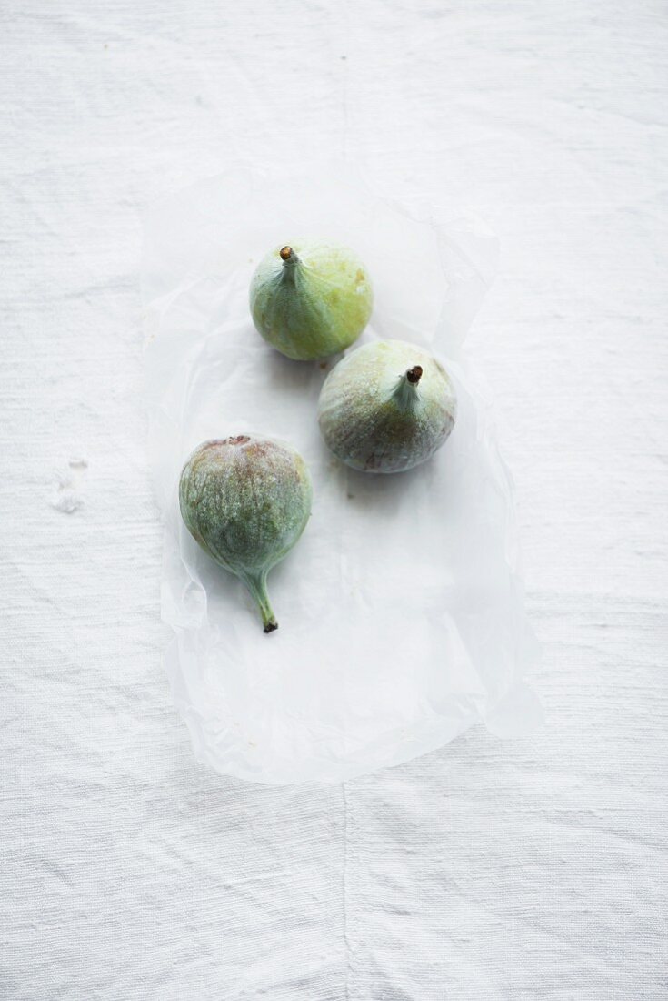 Figs on a white surface