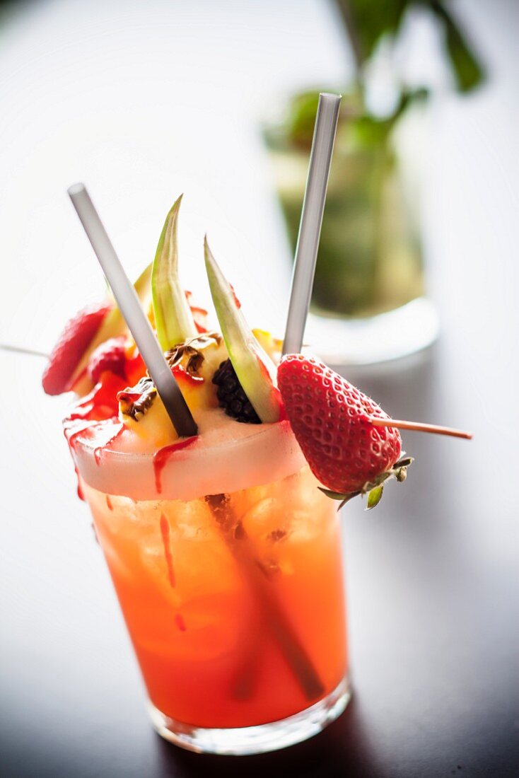 An alcohol-free cocktail with a fruit skewer