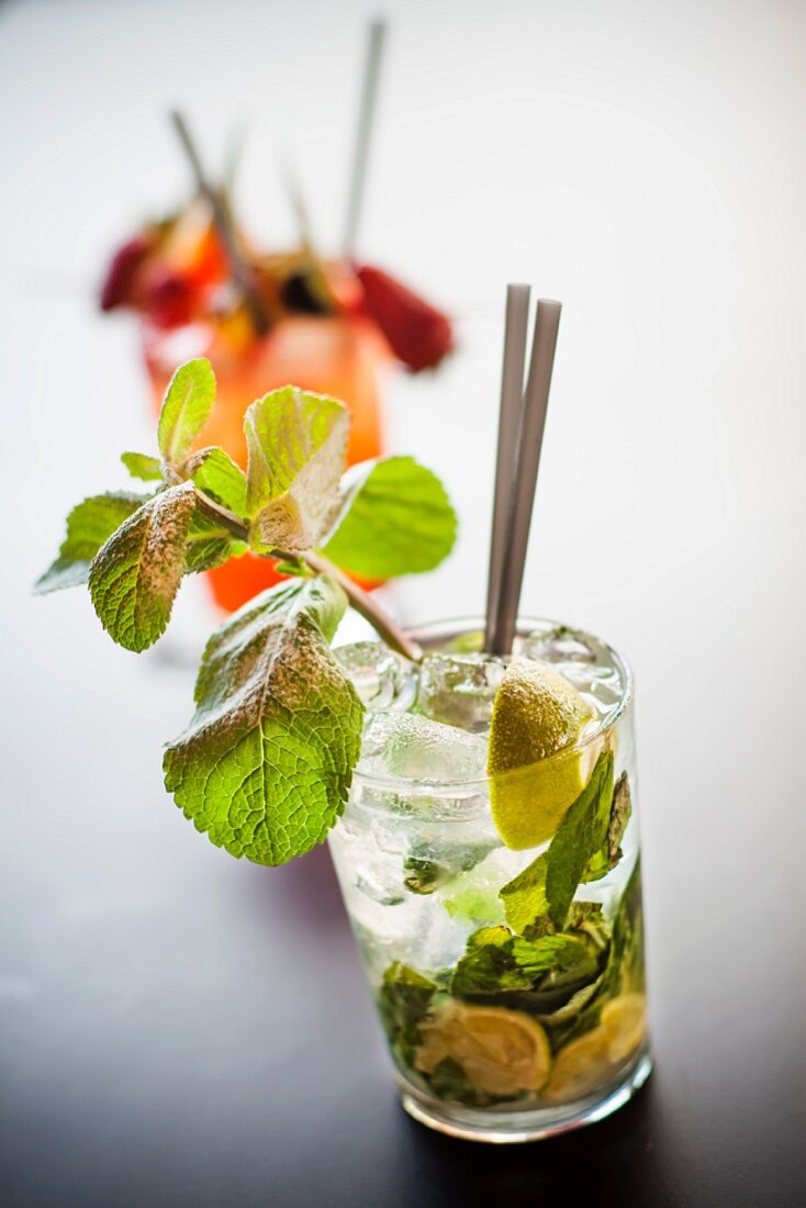 Mojito (cocktail made with white rum, limes and peppermint)