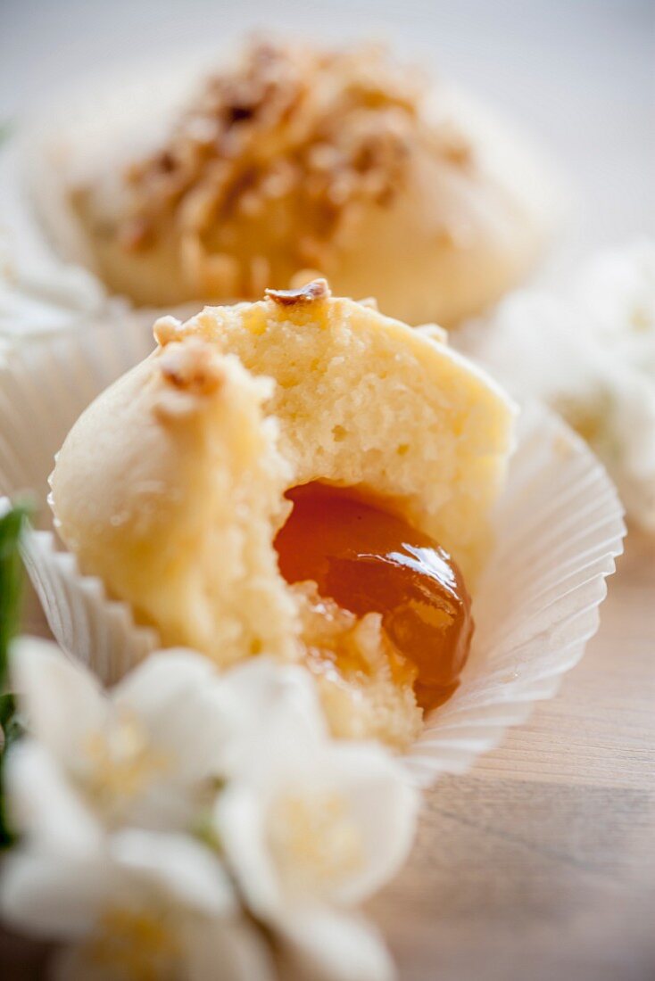 Muffins with chopped almonds and and apricots core