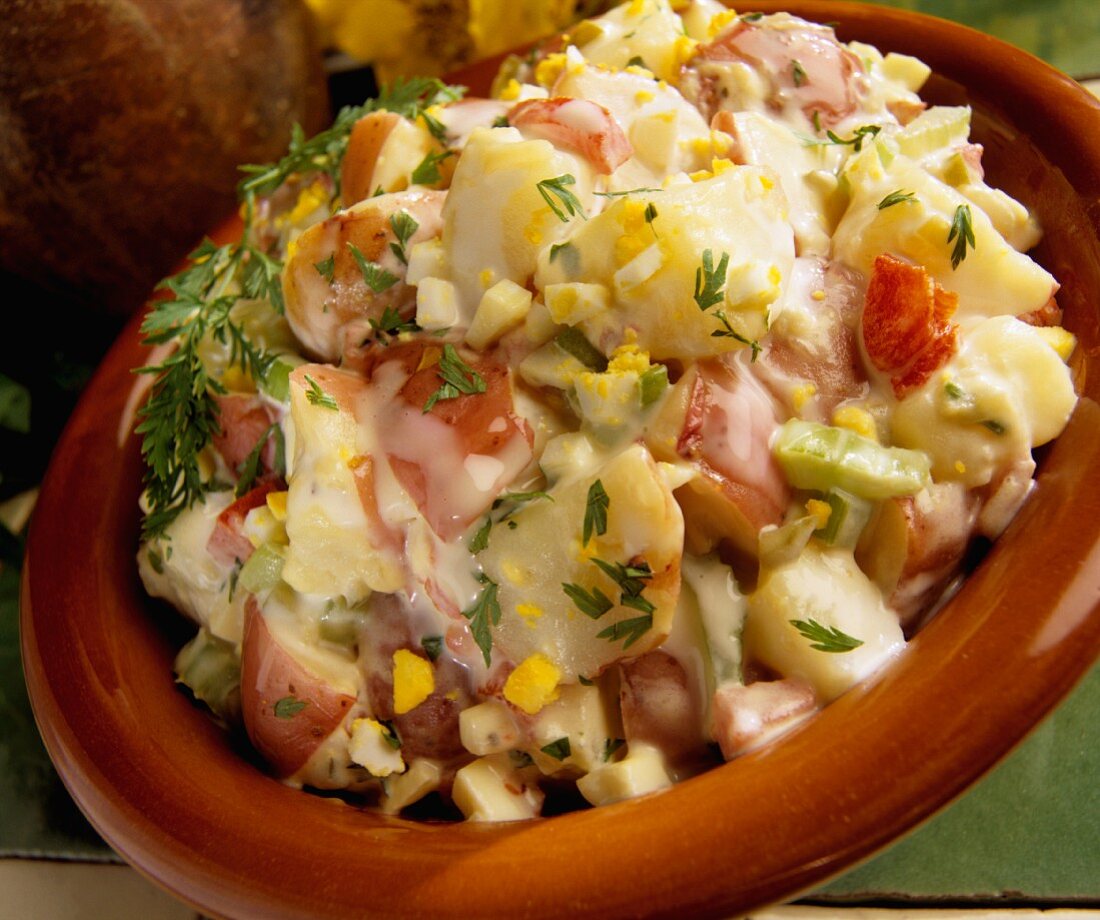 Potato salad made with red potatoes (close-up)