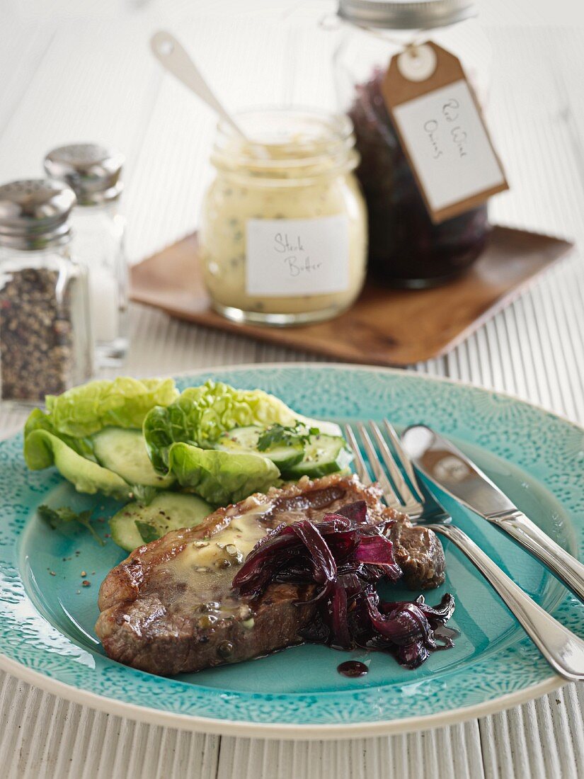 Beef steak with herb butter and onion confit