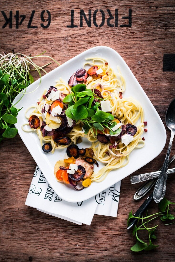 Tagliatelle with slice turnips, feta cheese and purslane