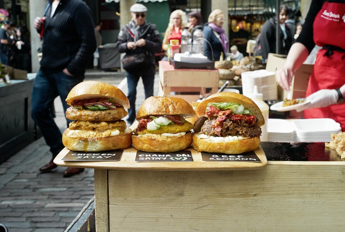 Hamburgers in a street shop at a market (Covent Garden, London)