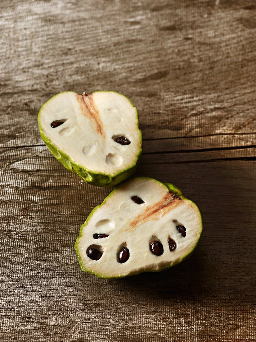 A custard apple, halved