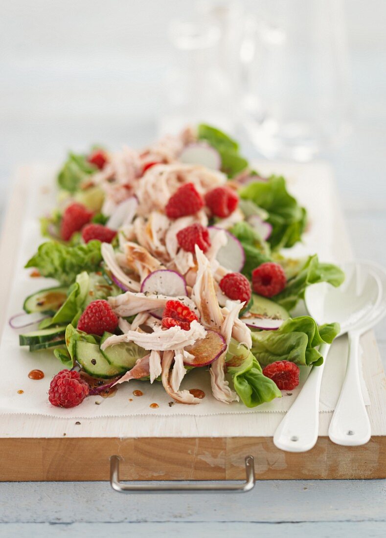 Chicken salad with raspberry and radishes