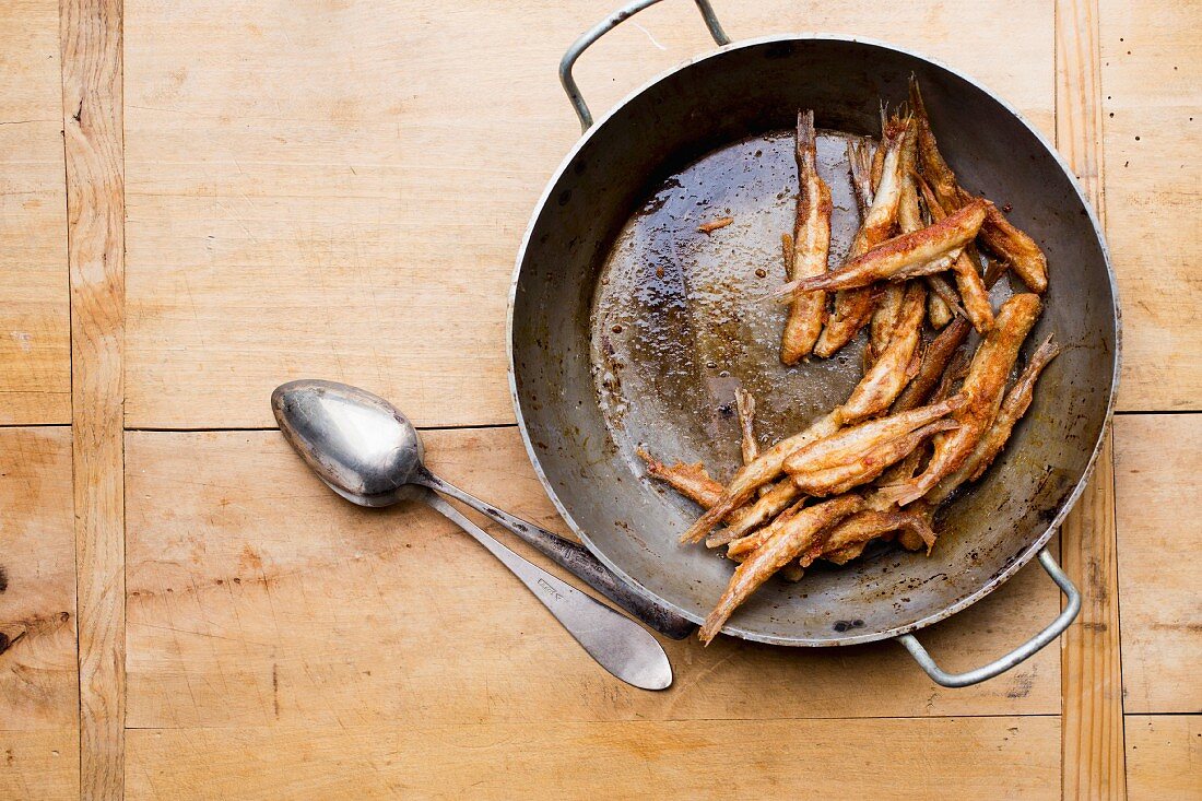 Fried smelts in a pan