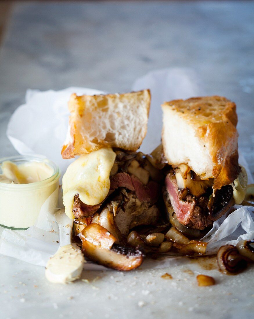 Toast with minute steak, mushrooms and Cheddar cheese