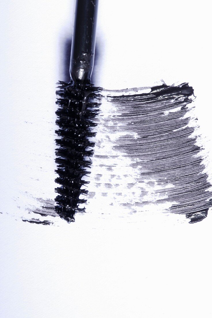 Black mascara on a white surface