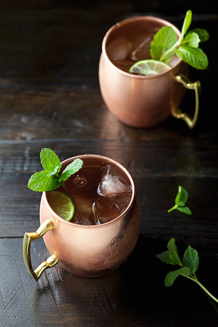 Moscow mule cocktails made with vodka, lime and mint