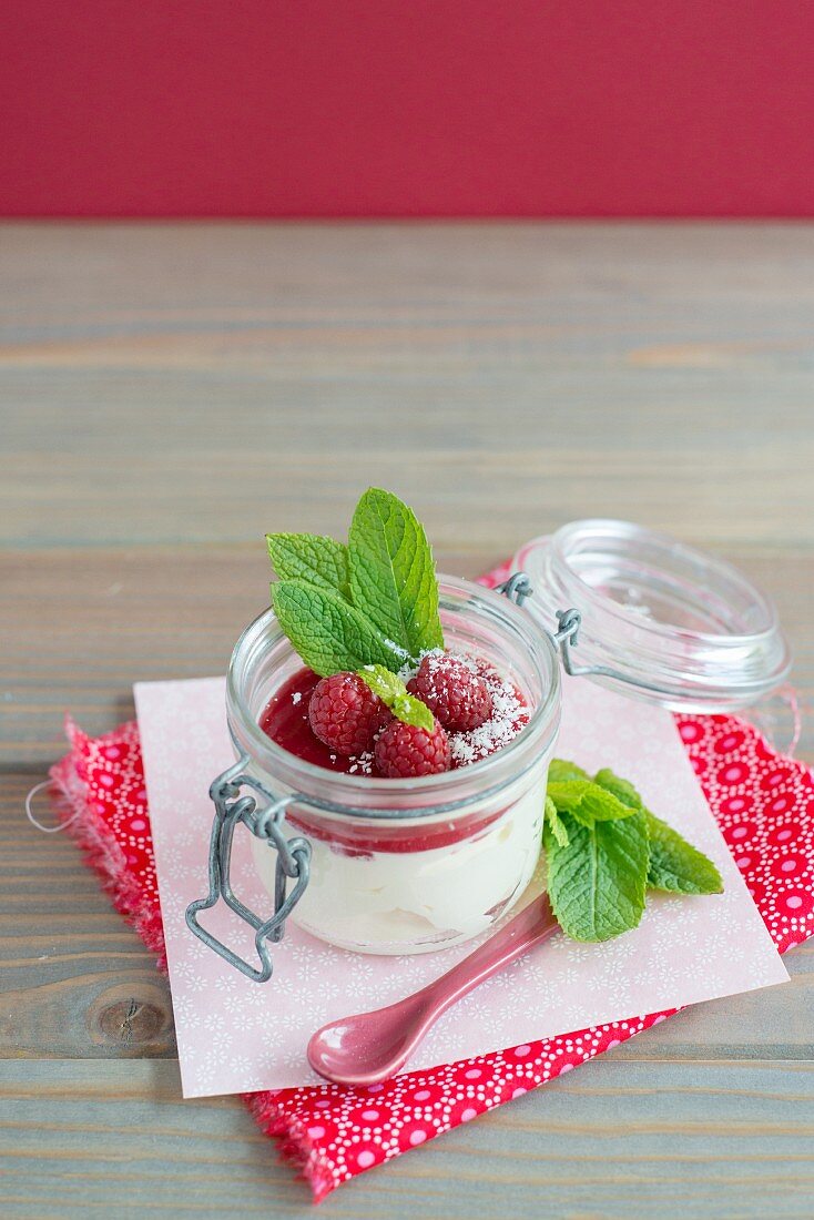 White chocolate mousse with raspberries and mint