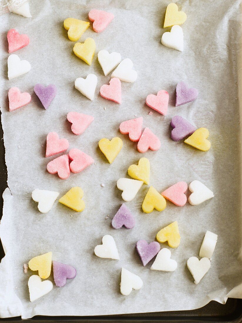 Sugar hearts on a baking tray