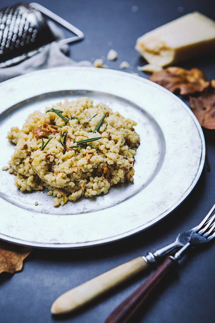 Risotto with mushrooms, goat's cheese and rosemary