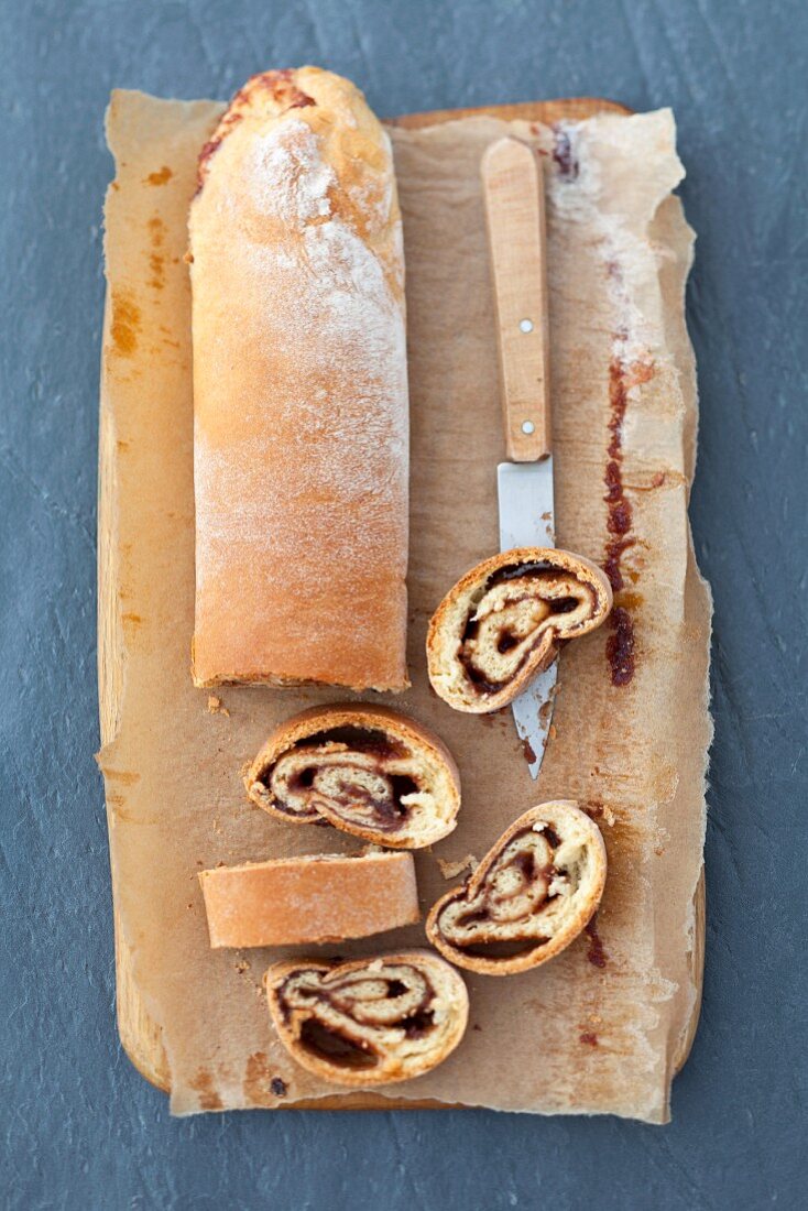 Yeast roulade with jam, sliced