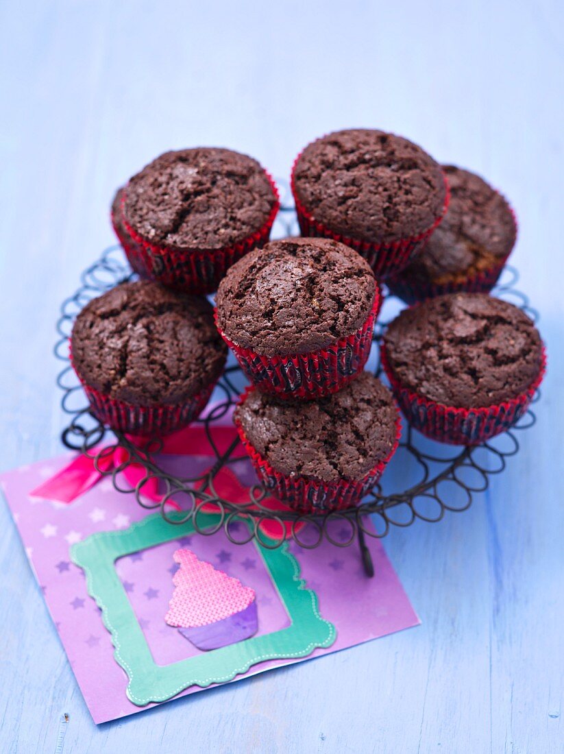 Chocolate muffins on a metal rack