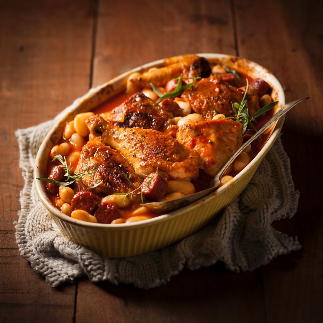 Chicken stew with butter beans and sausages