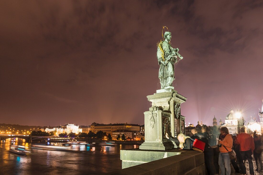 A statue of John of Nepomuk on the Charles Bridge, Prague
