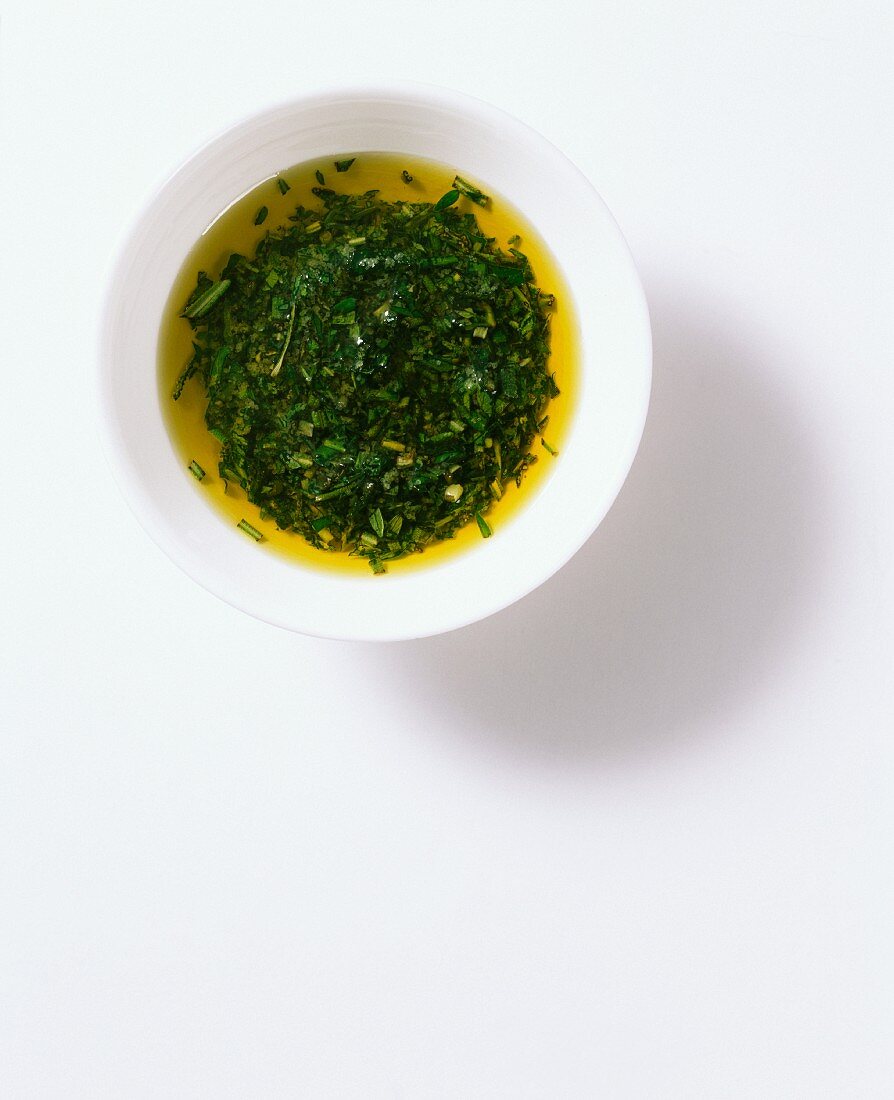A bowl of Italian herb oil