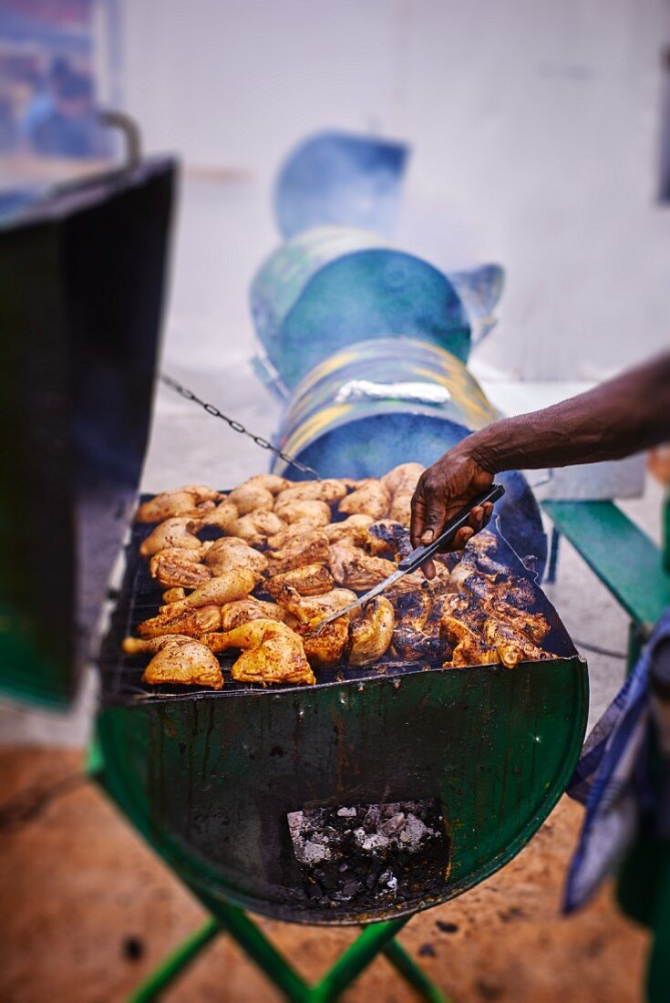 Chicken legs on a barbecue (Jamaica)