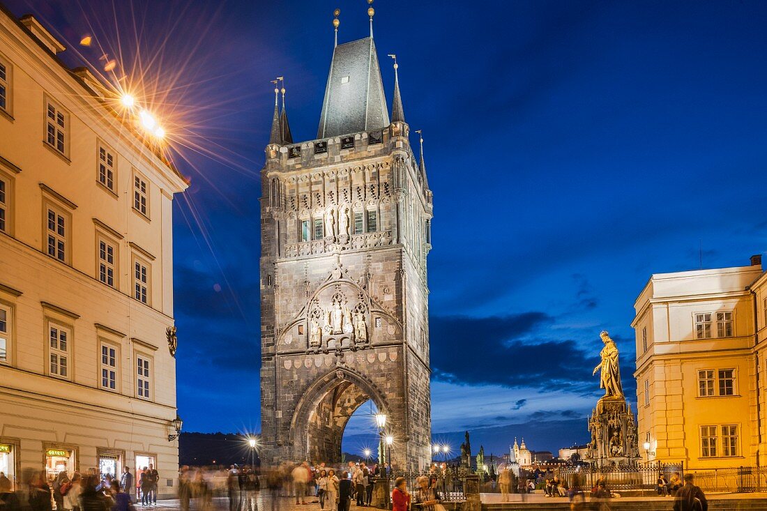 The illuminated bridge tower in Prague