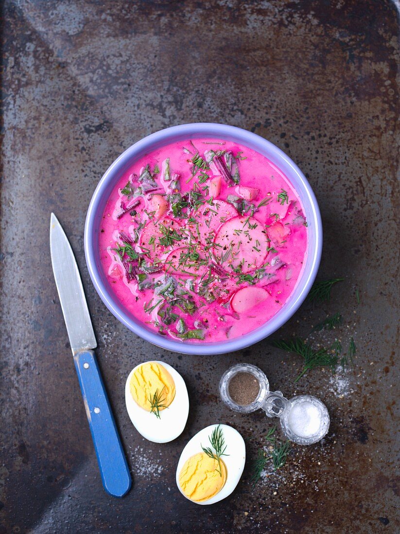 Cold beetroot soup with beetroot leaves, yoghurt, radishes and dill