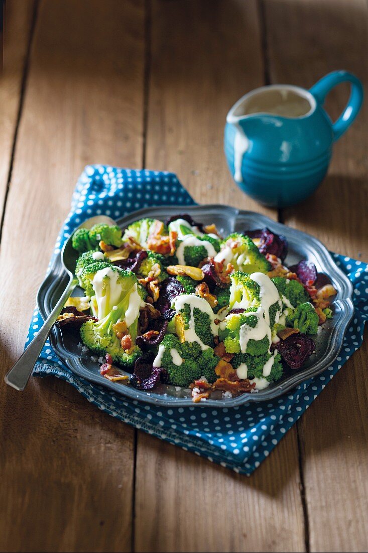 Warm broccoli salad with crispy beetroot and bacon