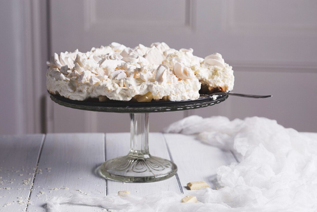 Pina colada cake with meringue, pineapple and coconut