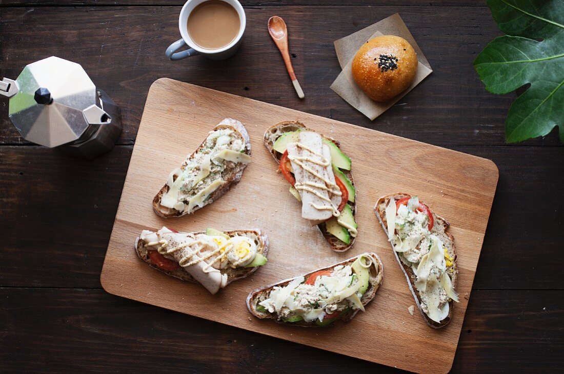 Open sandwiches on a wooden board