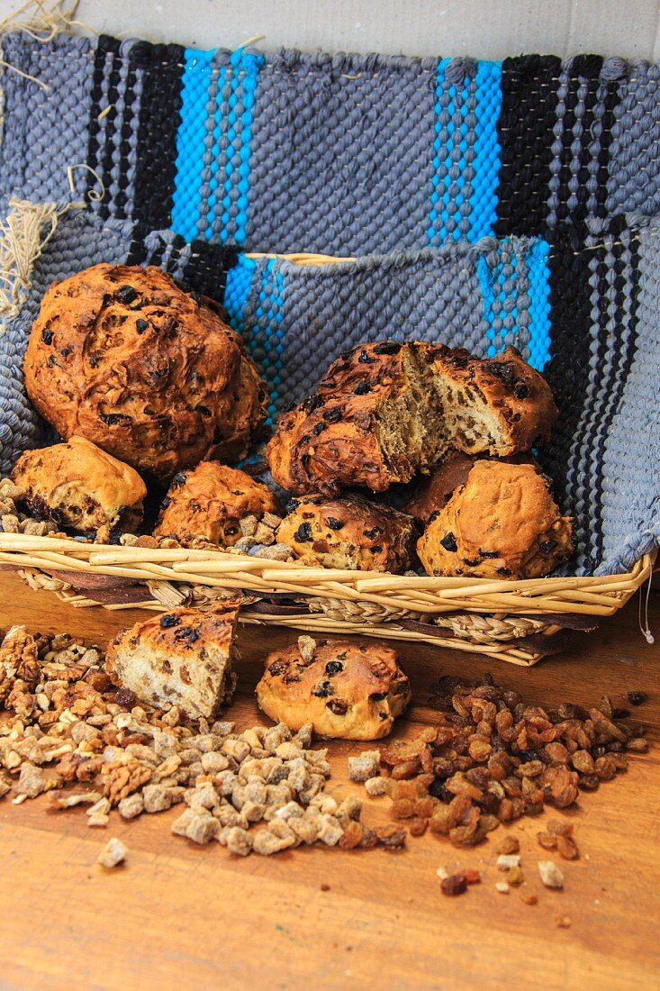 Basket of Bisciola, typical Italian bread made with walnuts, raisins and figs from Valtellina, Lombardy, Italy, Europe