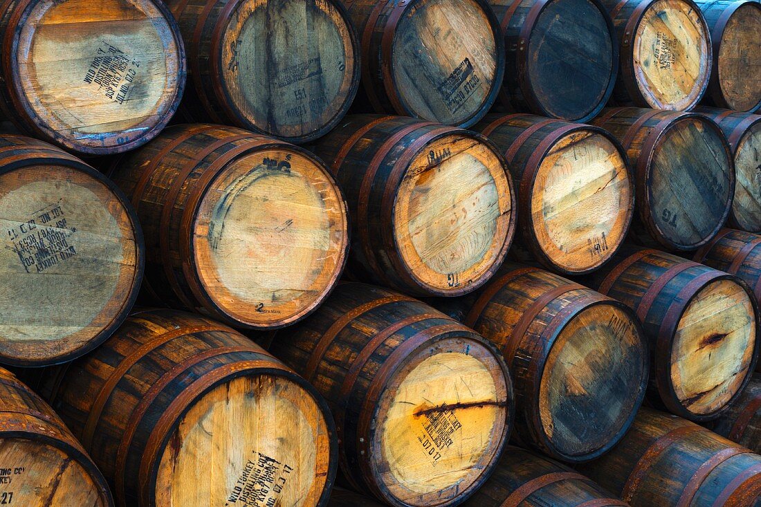Stacks of wooden barrels at Port Askaig, Islay, Argyll and Bute, Scotland, United Kingdom, Europe
