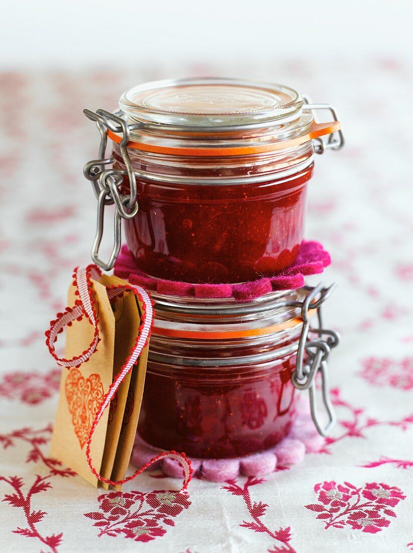 Berry jam in flip-top jars with gift tags