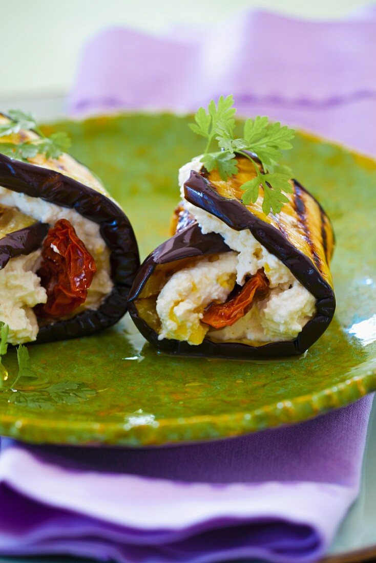 Aubergine rolls with goat's cream cheese, dried tomatoes and olive oil