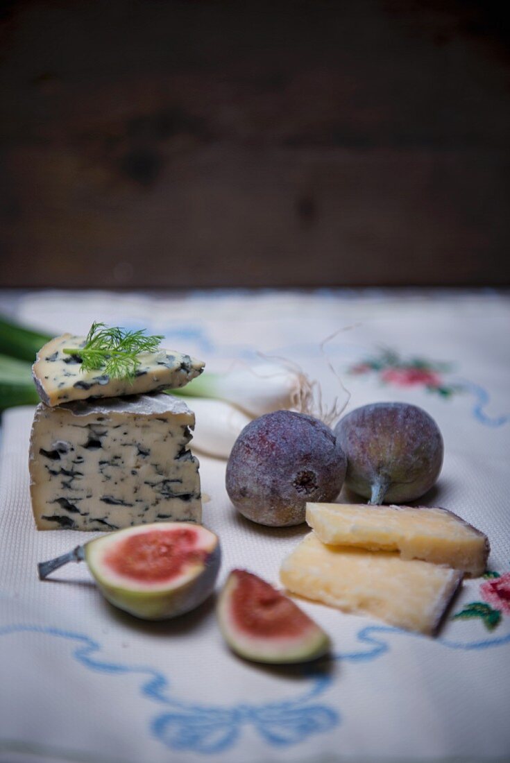 Fourme D'Ambert (French blue cheese) wine hard cheese from Italy with figs and spring onions