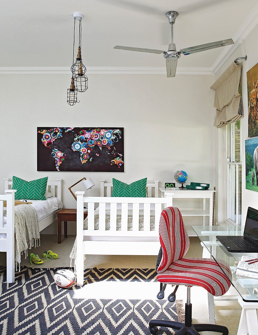 Twin beds and desk in children's bedroom