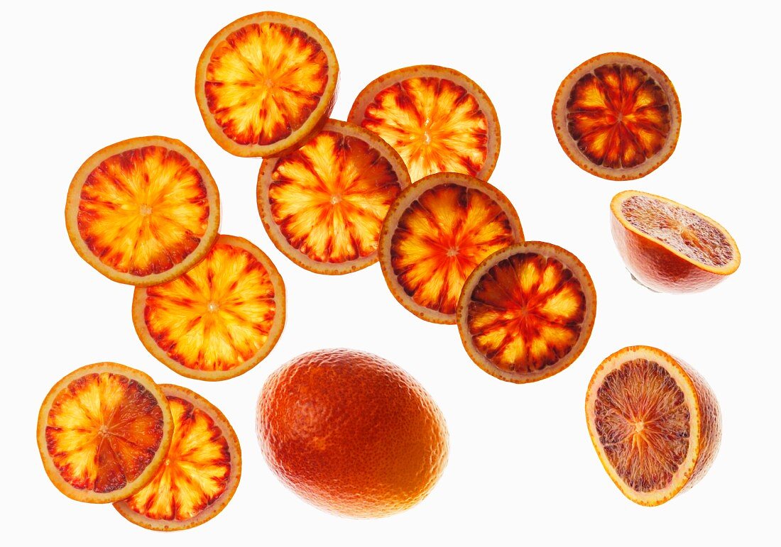 Blood oranges, whole, halved and sliced