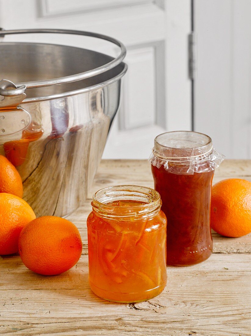 Homemade marmalade with peel, and blood orange marmalade