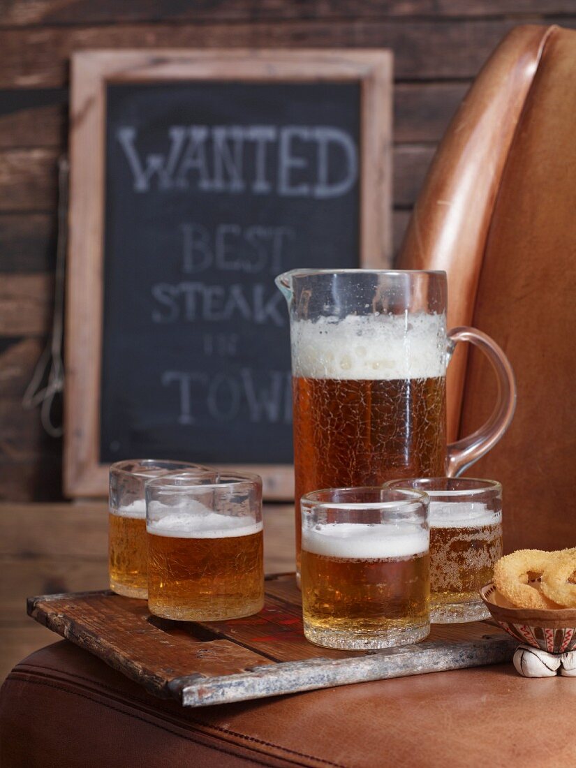 Beer in a jug and in glasses