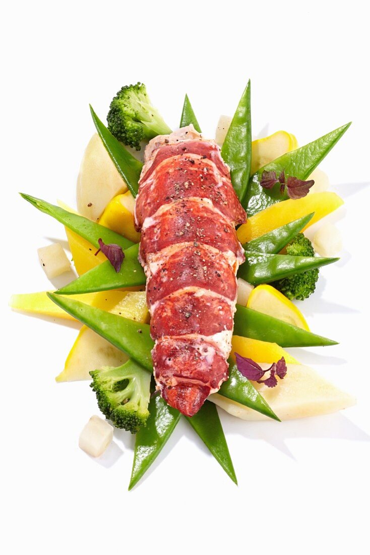 Lobster on mange tout, broccoli and lemons