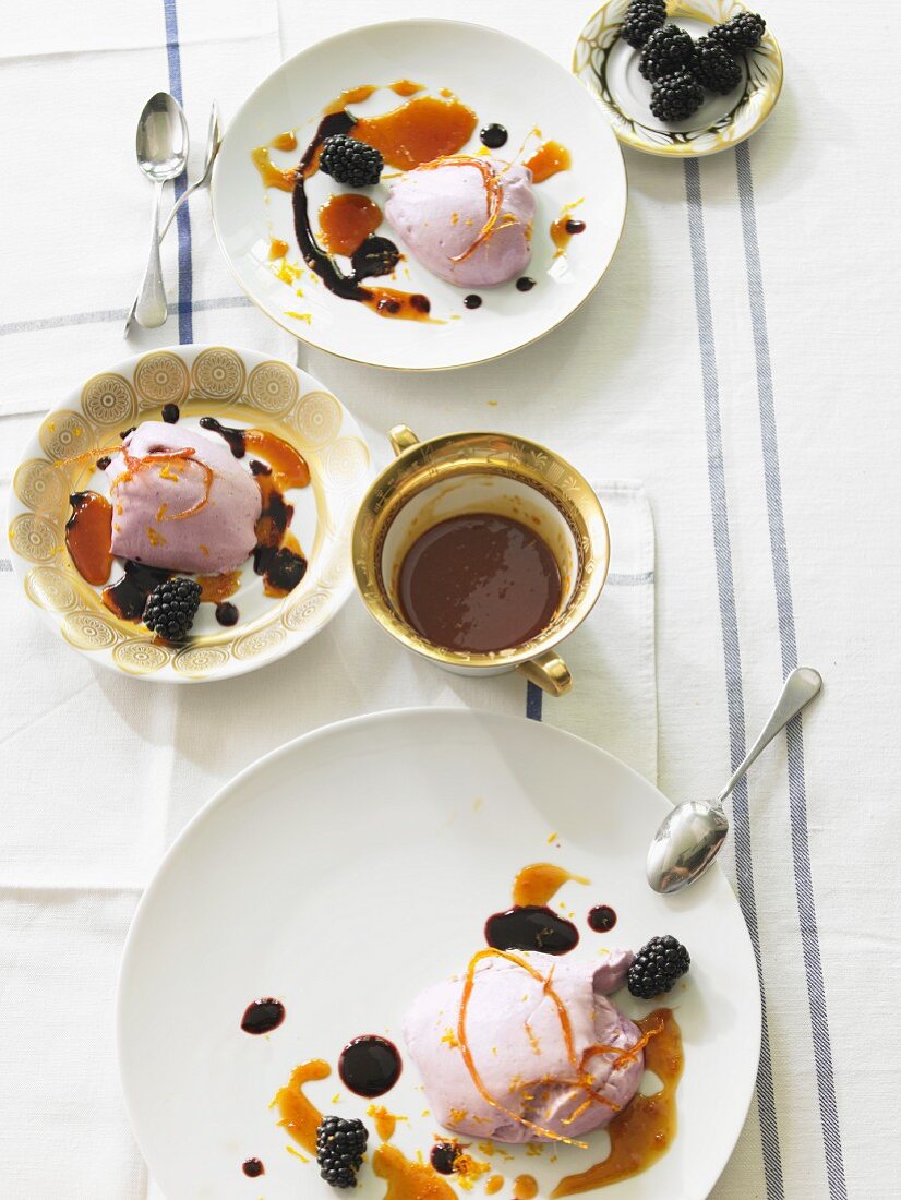 Blackberry mousse with orange syrup