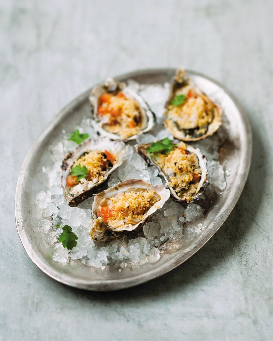 Oysters with a tomato and shallot dressing and chilli breadcrumbs
