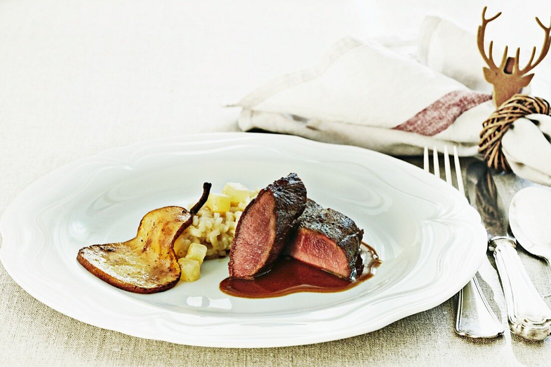 Saddle of venison with pear risotto