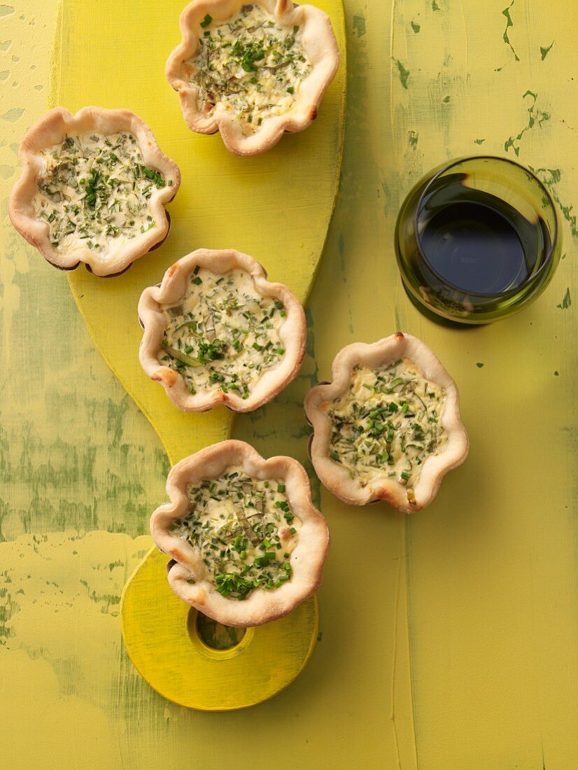 Herb and cheese quiches