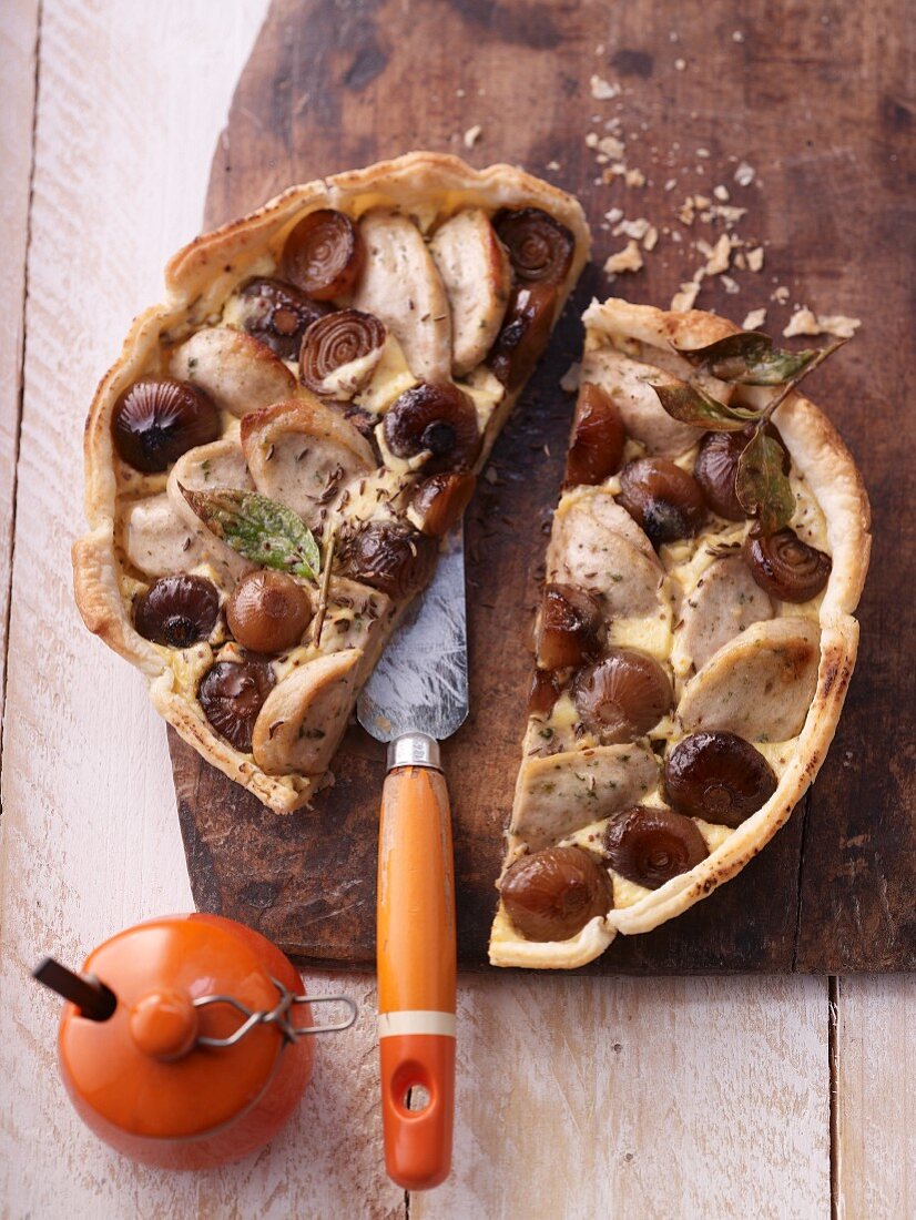 A pickled onion and white sausage tart